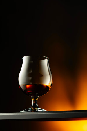 Brandy snifter on a dark background. Copy space.の写真素材