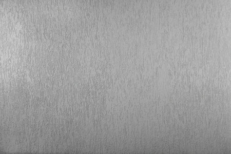 The decorative plaster is painted grey. Copy space for your promotional text or advertisement. Blank gray wall. Empty area.の写真素材
