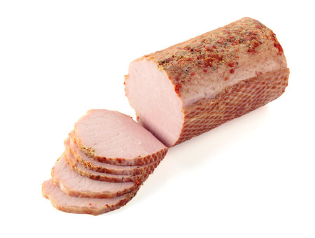 Sliced ham isolated on a white background.の写真素材