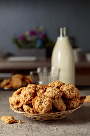 Oatmeal cookies and milk on a kitchen table. Copy space.の写真素材