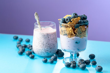 Blueberry dessert with rye flakes and smoothie with chia seeds. Concept of eco food. Copy space.の写真素材