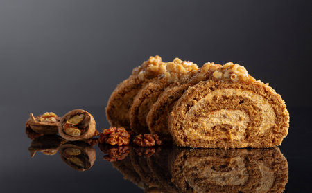 Walnut and buttercream roll: a traditional pastry. Copy space.の写真素材