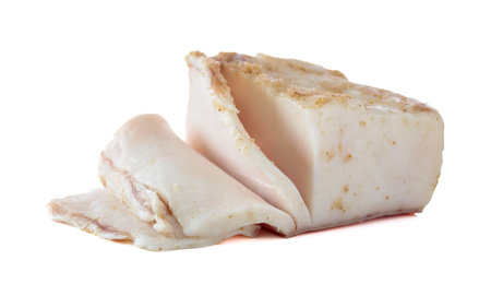 Salted lard with spices isolated on a white background.の写真素材