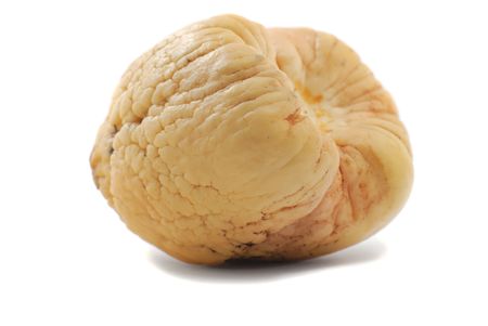 A close-up of avacado's pip on white backgroundの写真素材