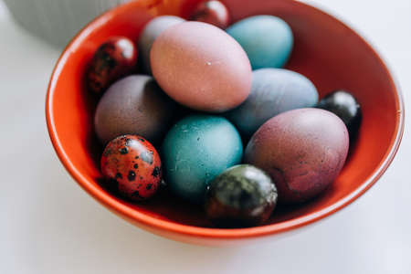Easter eggs in a plate on the tableの写真素材
