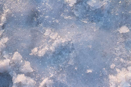 background of loose ice and snow closeup