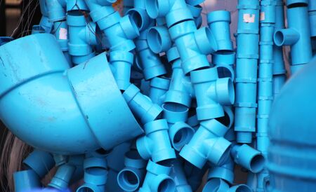 Plastic sanitary fittings of different sizes in the repair shop