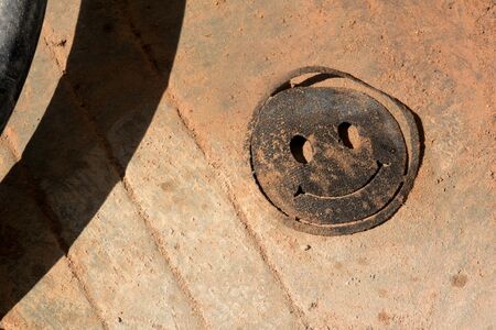 The fuel filter at a gas station looks like a cheerful smile, Cambodia 