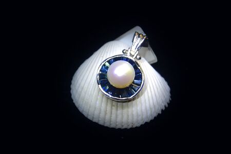 40 Pendant. Silver, Sapphires baguette, Natural pearls Exclusiveの写真素材