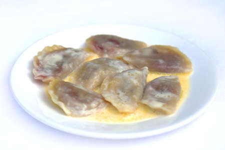 Boiled Dumplings with Cherry in Butter, dishes of Russian national cuisine, restaurant, servingの写真素材