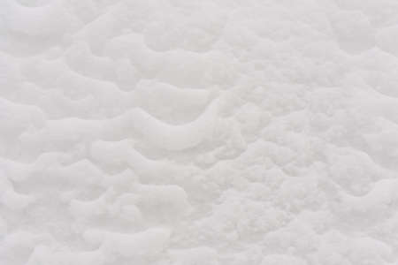 beautiful texture of white snow outsideの写真素材