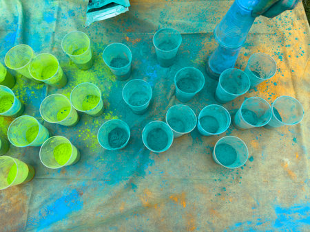 Green plastic cups on the table. Top view. Toned.の写真素材