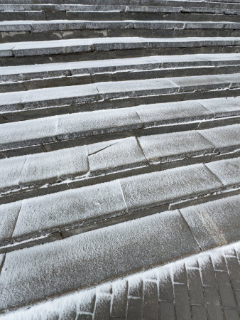 Stairs covered with snow in a park, closeup of photoの写真素材