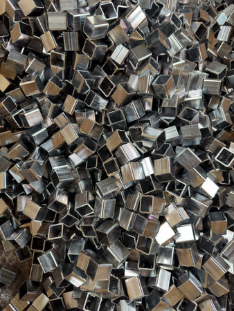 Metal profile square in packs at the warehouse of metal products, Russiaの写真素材