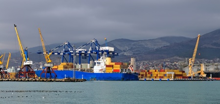 Loading container ship in harbour