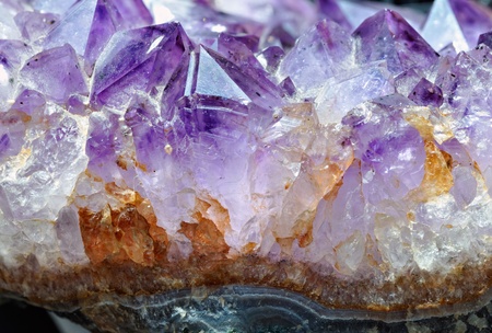 Raw amethyst isolated on white background
