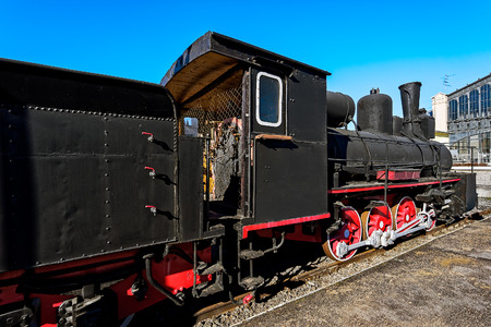 Old russian freight steam locomotive series Od, builded in 1900, in railway station.
