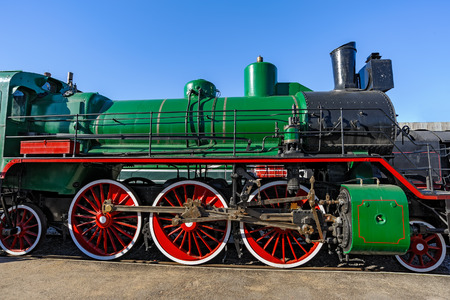 Close-up view to steam locomotive wheelsの写真素材