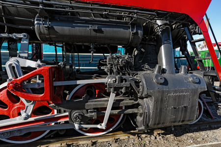 Close-up view to steam locomotive wheels