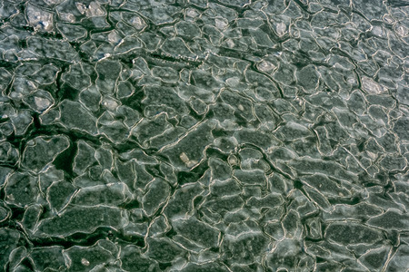 Pancake ice, early stage of formation of sea ice in Bohai Sea or Bo Sea, also known as Bohai Gulf or...