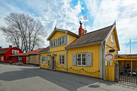 Colorful houses in the historic center of Sigtuna. Founded in 980 Sigtuna is the oldest city in Sweden and a popular tourist destination.のeditorial素材