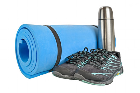 A pair of new girl sport outdoor shoes, all logos and markings removed. Studio shot on white, not isolatedの写真素材