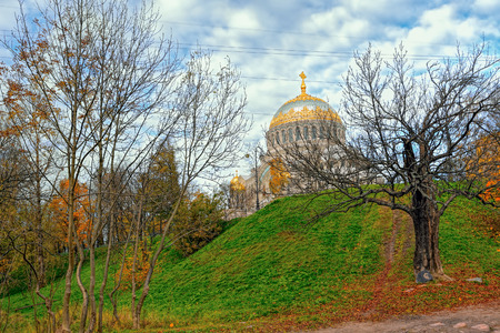 Autumn view to Naval cathedral of Saint Nicholas from Petrovsky dock basin in Kronstadt at the island Kotlin near the Saint-Petersburg, Russiaの写真素材