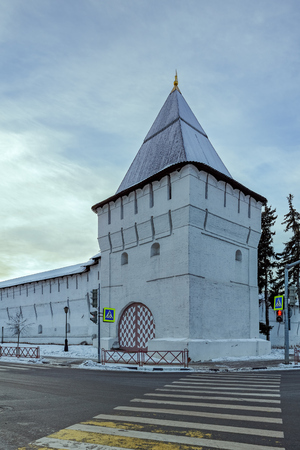 Winter view to ancient wall and Uglichsky tower of Spaso-Preobrazhensky Holy Transfiguration Monastery in Yaroslavl, Russiaのeditorial素材