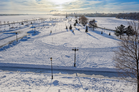 Parkland "Strelka" (Spit) at confluence of the rivers Volga and Kotorosl, place foundation of Yaroslavl and Monument to the 1000 anniversary of Yaroslavlat cold winter sunriseのeditorial素材