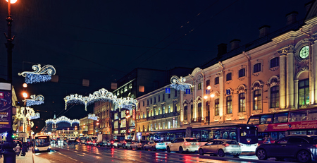 ST.PETERSBURG, RUSSIA - December 29, 2016: Beautiful night view of Nevsky Prospect in Saint Petersburg with snow blizzard and New Year and Christmas lighting decorationのeditorial素材