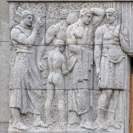 Sculptural decoration on the Northern Moderne style Azov-Don Bank Building from grey Karelian granite with sculptures and bas-reliefs by Vasiliy Kuznetsov (1912-1913).のeditorial素材