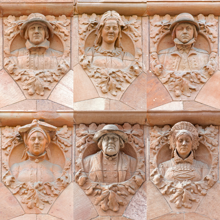 Sculpture of the Scania genre by Christian Eriksson on the facade of Skanebanken, Drottninggatan in Stockholmのeditorial素材