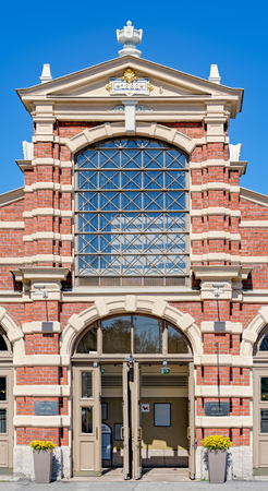 Close-up of details of the richly decorated facade of the renovated Old Market Hall (Vanha kauppahalli) by architect Gustaf Nystrom (1889).のeditorial素材