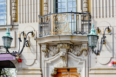 Sveriges Privata Centralbank (Sweden's Private Central Bank) gold-plated monogram in the forged balcony rack above the entrance of the massive baroque palace.のeditorial素材