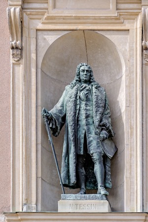Bronze statue of Nicodemus Tessin, famous Swedish architect, by Johan Axel Wetterlund (1900) on southern facade of Royal Palace in Gamla Stan.のeditorial素材