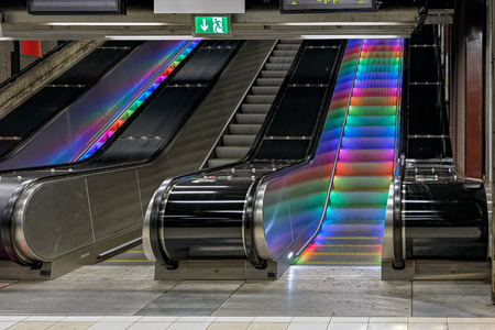 Colourful illuminated escalator steps in metro station, Stockholm, Swedenのeditorial素材