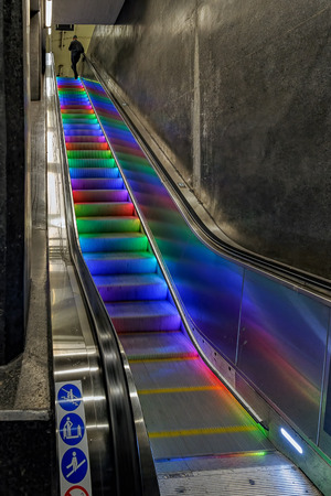 Colourful illuminated escalator steps in metro station, Stockholm, Swedenのeditorial素材