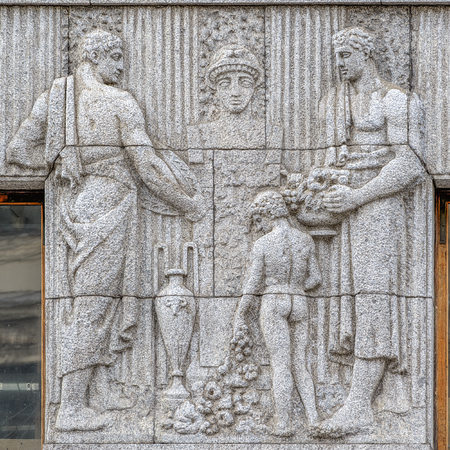 Sculptural decoration on the Northern Moderne style Azov-Don Bank Building from grey Karelian granite with sculptures and bas-reliefs by Vasiliy Kuznetsov (1912-1913).のeditorial素材