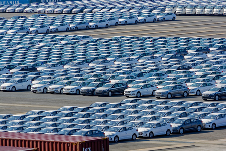 GWANGYANG, SOUTH KOREA - Feb 18, 2017: Rows of new cars waiting to be dispatch and shipped around the world from the cargo port in South Korea.のeditorial素材