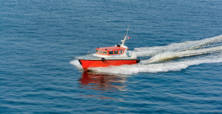 JOHOR STRAIT, MALAYSIA - March 09, 2017: Pilot boat at full speed in the waters of the Johor strait, Malaysiaのeditorial素材