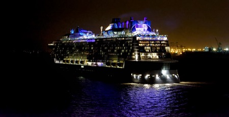 SHANGHAI, CHINA - Dec 24, 2016: Quantum-Class giant cruise passenger ship 'Quantum of the Seas' by Royal Caribbean International (RCI) sails with Lights illuminate at night near Shanghai.のeditorial素材