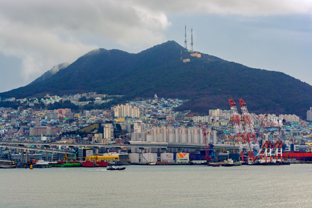 BUSAN, SOUTH KOREA - December 22, 2016: Giant floating crane in front of Busan Shipbuilding & Offshore Co., Ltd. shipyard on Geoje island in the Harbor of Busan, South Koreaのeditorial素材