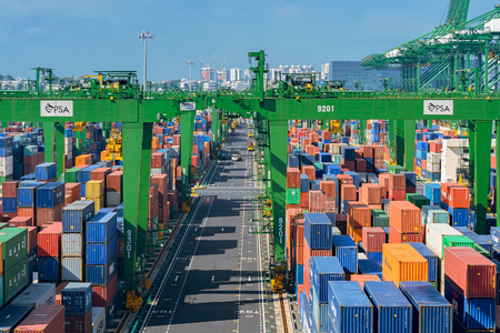 SINGAPORE, MALAYSIA - Apr 04, 2017: Shipping containers are stacked at the PSA container terminal.
