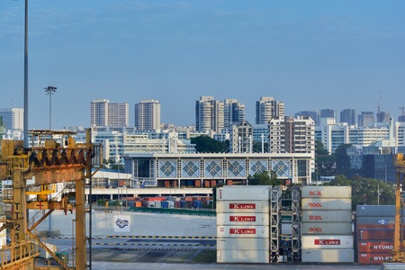 SINGAPORE, MALAYSIA - Mar 10, 2017: Sunset view of highrise residential buildings behind of Port of...