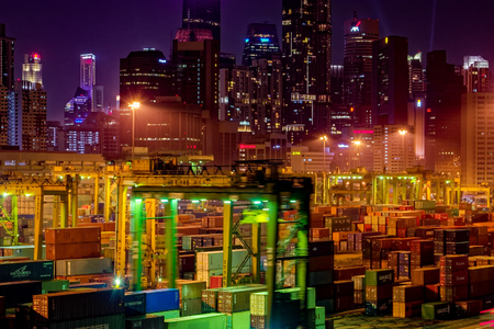 SINGAPORE, SINGAPORE - Sep 15, 2017: Night view of cargo operations in Singapore container terminal, run by PSA, one of the busiest shipping terminals in the world. Keppel Harbour, Singapore.のeditorial素材