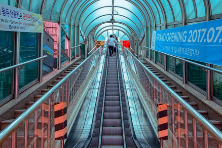 BUSAN, SOUTH KOREA - Sep 04, 2017: Interior of escalator to Yongdusan Park, up to the top of the hill from Gwangbok-ro Street.のeditorial素材