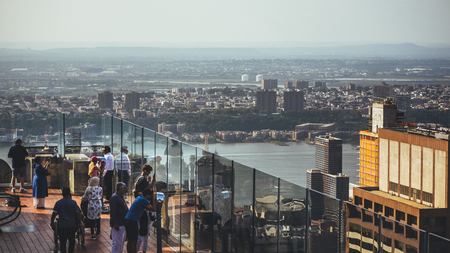 New York, USA / Circa 2016 / People enjoying a view from Rockfeller Center at New Jersey and Hudson Riverのeditorial素材