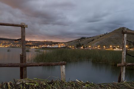 sunset on a lake Titikaka in mountains in south america, peru