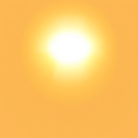 Sunset on a yellow background. The sun's rays are reflected in the lens.の素材