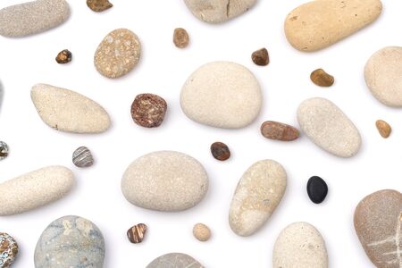 Mix of rounded multicolor textured stones. Isolated on white background flat layの写真素材